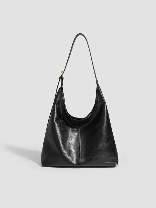 Schwarze Hobo-Tasche aus weichem Leder, geräumige Schultertasche für Damen